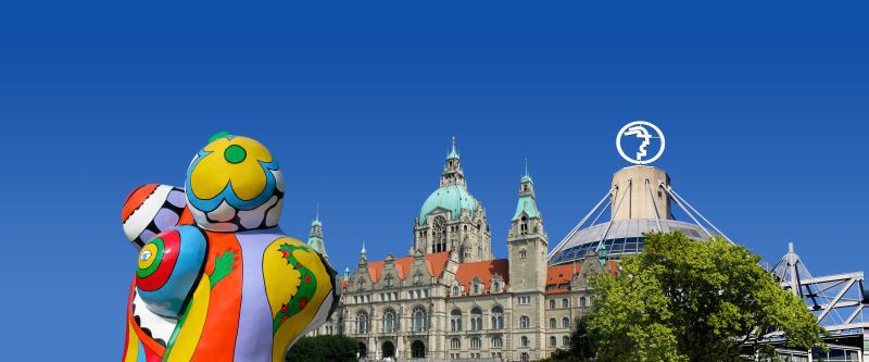 Nanas, Rathaus und die Messe auf blauem Hintergrund
